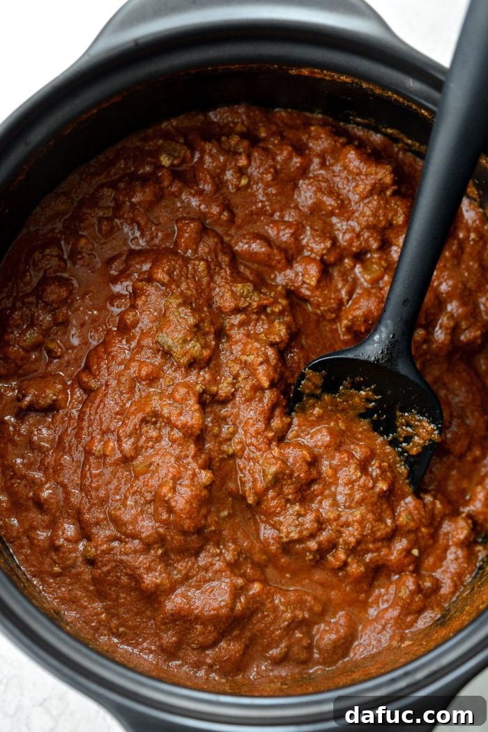 Walking Tacos Two Ways 16 A pot of no-bean chili simmering on the stove.