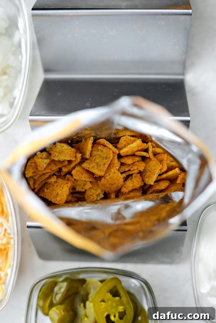 Walking Tacos Two Ways 17 Crushed Fritos in an individual bag, ready for chili and toppings.