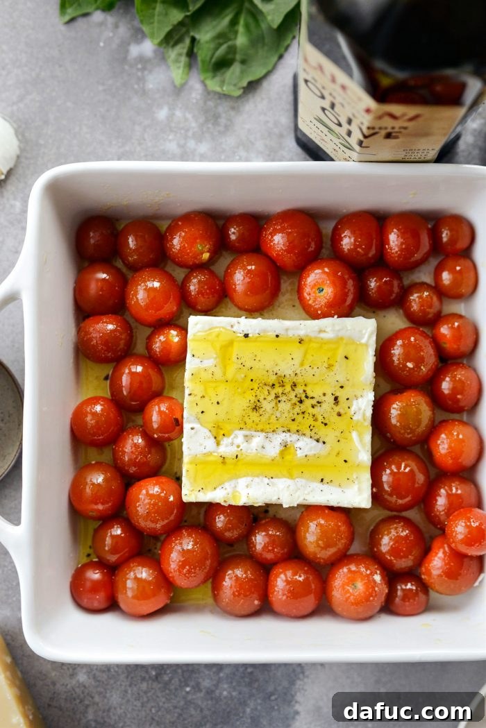 Blistered Tomato Feta Pasta 11 Seasoning the block of feta cheese with salt and pepper
