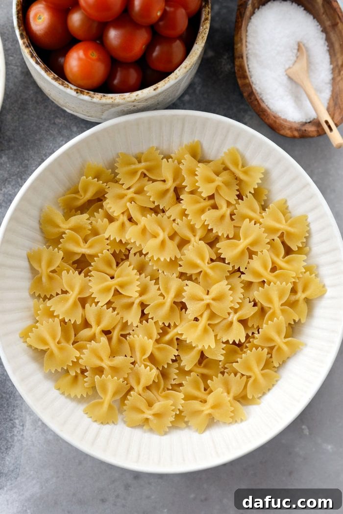 Blistered Tomato Feta Pasta 12 Uncooked short pasta waiting to be boiled
