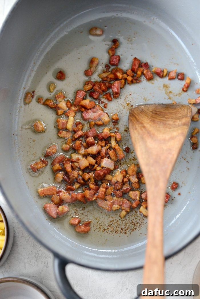 Ina Garten's Cozy Winter Minestrone 6 Crispy pancetta removed from the pot