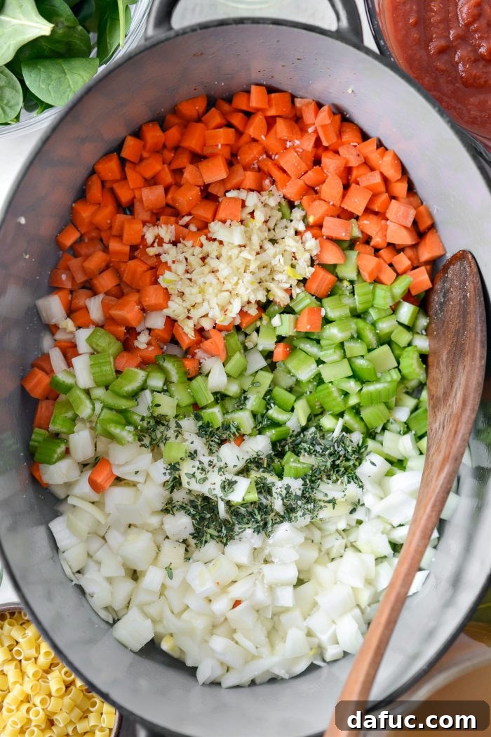 Ina Garten's Cozy Winter Minestrone 8 Prepared vegetables and herbs added to the pot
