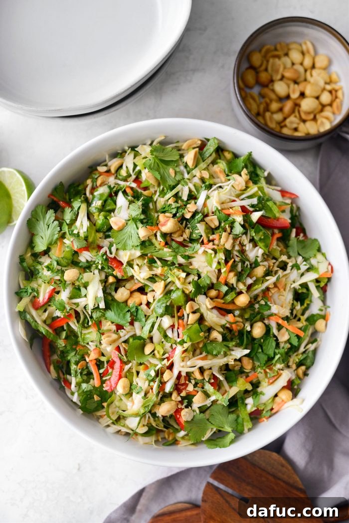 Zesty Thai Cabbage Slaw 10 Thai Cabbage Salad served attractively in a white serving bowl.