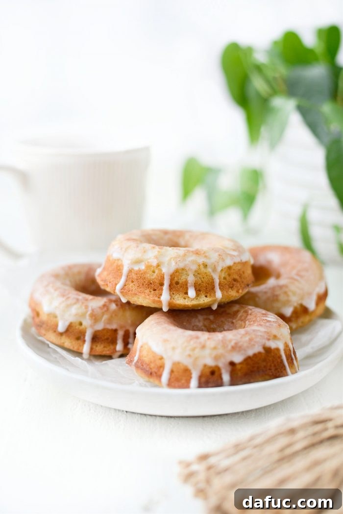 A final close-up image of the Glazed Buttermilk Cake Doughnuts, showcasing their texture and glaze.
