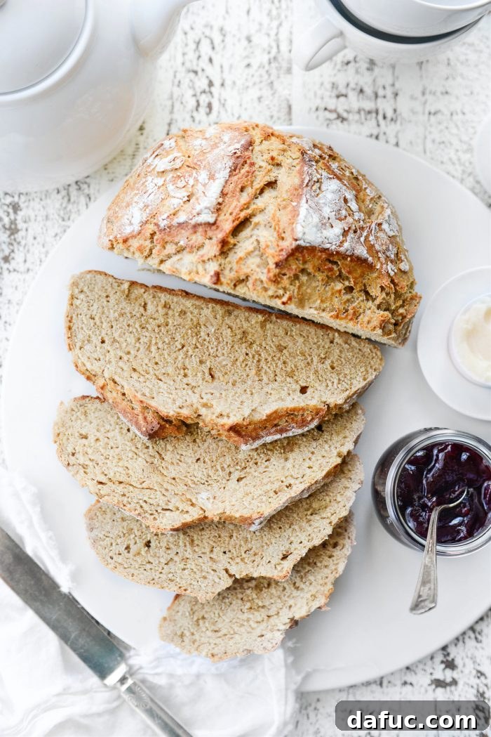 Hearty Irish Hearth Bread 3 A freshly baked loaf of Irish Soda Bread on a cooling rack