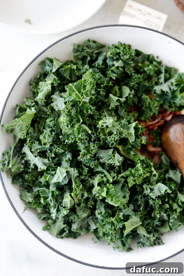 Colcannon Irish Comfort Mash 14 chopped kale added to bacon in skillet