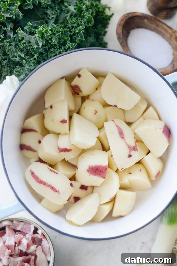 Colcannon Irish Comfort Mash 6 peeled potatoes in a pot