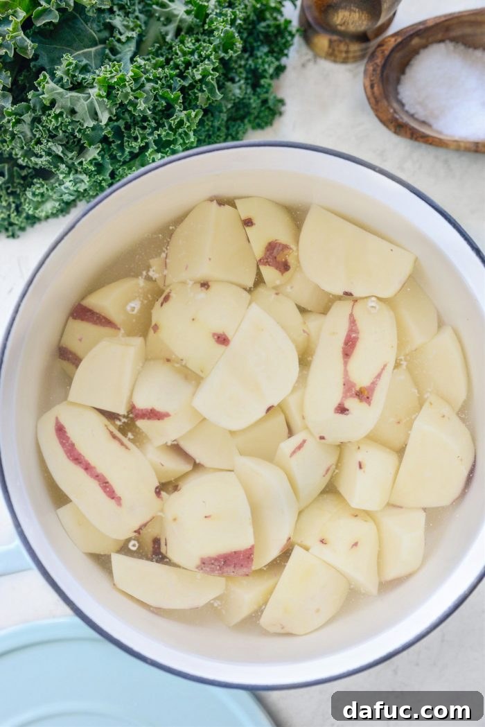 Colcannon Irish Comfort Mash 7 potatoes in a pot covered with water