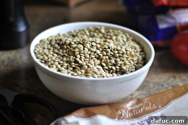 Hearty Plant-Based Lentil Stew 5 Sorting lentils in a bowl