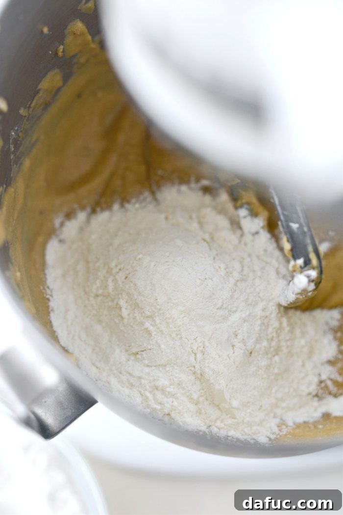 Emerald Isle Whiskey Cake 15 Gradually adding dry ingredients to the wet batter