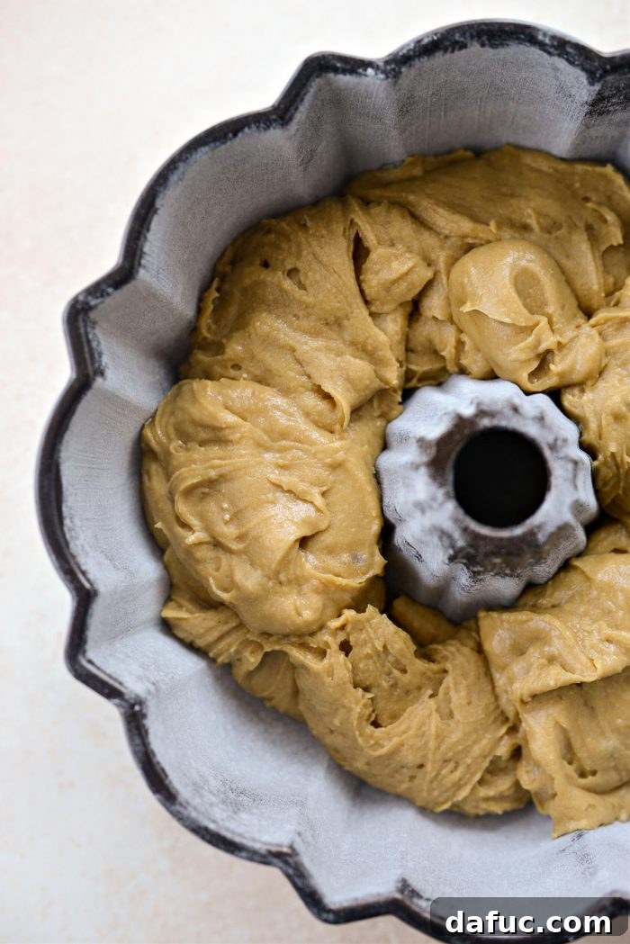Emerald Isle Whiskey Cake 17 Spoon cake batter into the prepared bundt pan