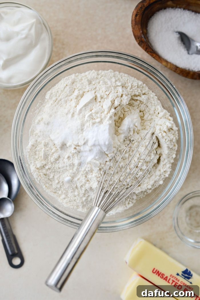 Emerald Isle Whiskey Cake 6 Bowl containing flour, baking soda, and kosher salt