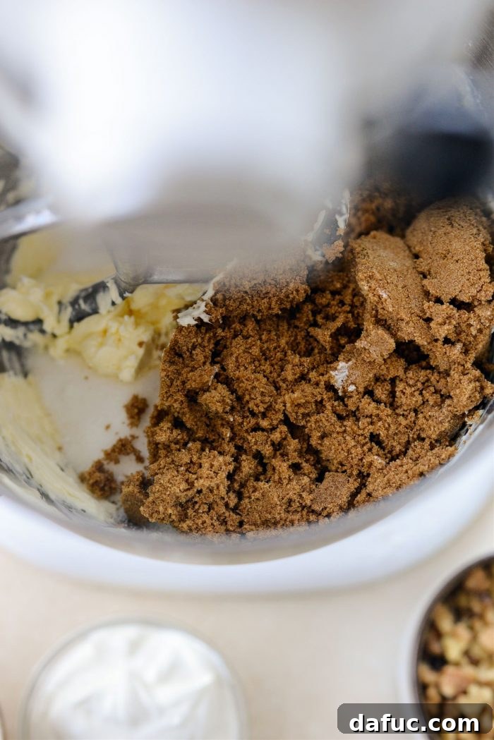 Emerald Isle Whiskey Cake 9 Granulated and dark brown sugars added to creamed butter in mixer