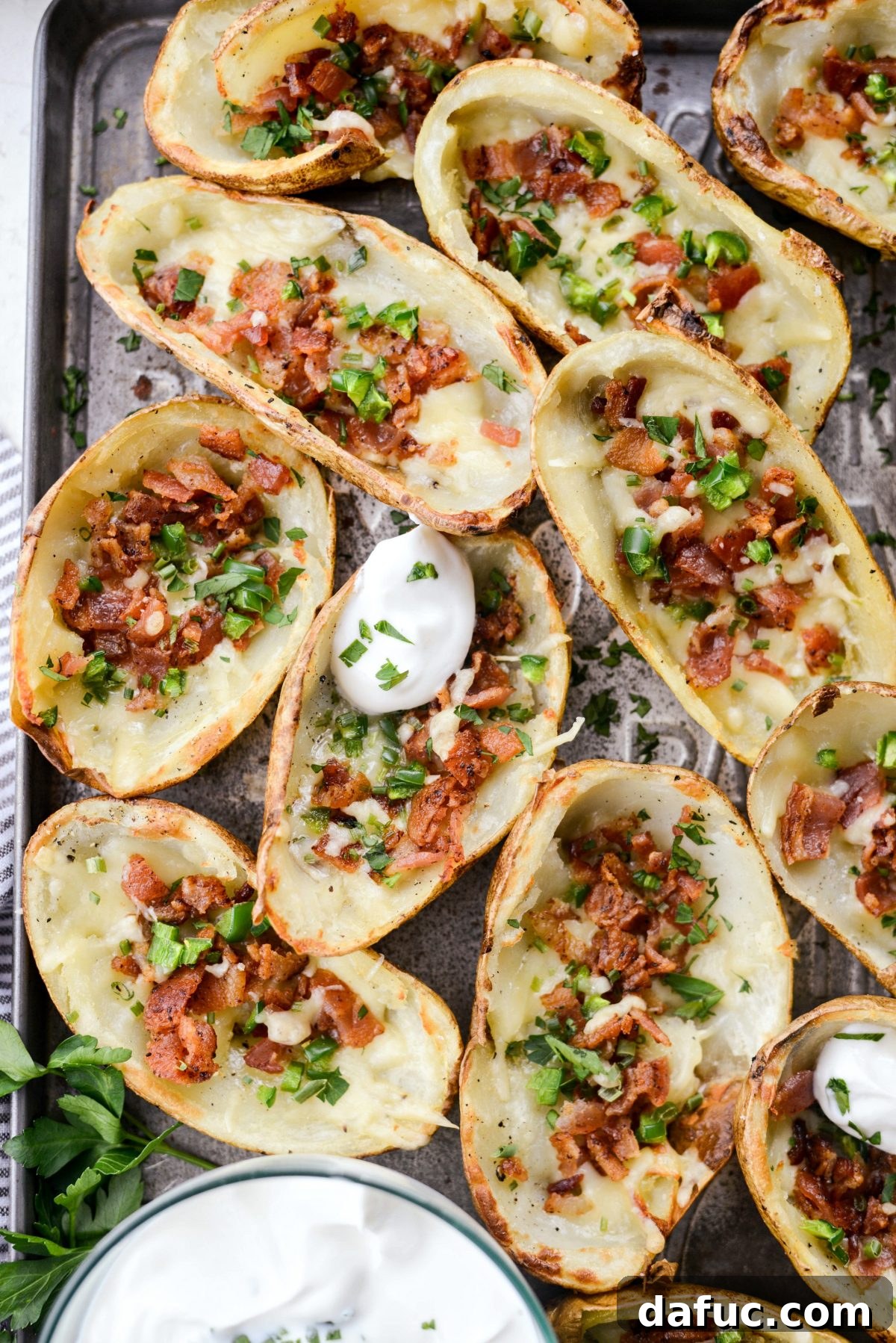 25+ Delicious St. Patrick's Day Recipes 14 Crispy Irish Cheddar Bacon Jalapeño Potato Skins with fresh chives and sour cream