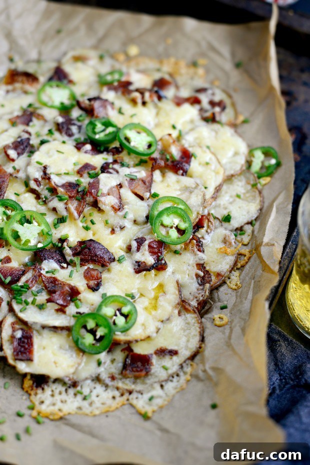 25+ Delicious St. Patrick's Day Recipes 16 Platter of crispy Irish Nachos topped with Irish cheese, bacon, and chives