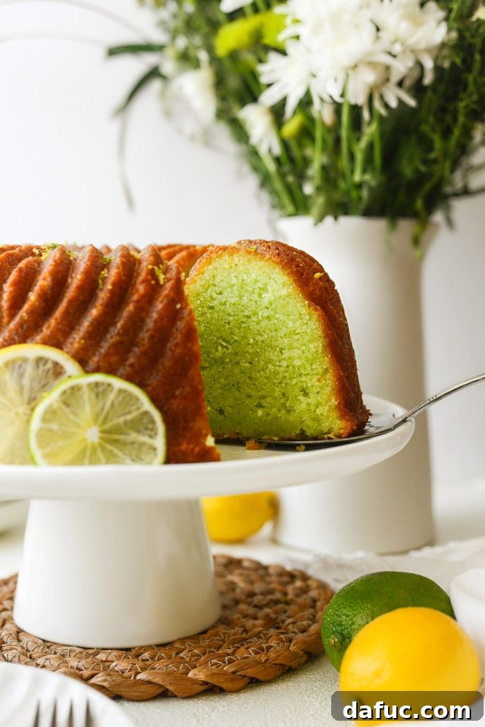25+ Delicious St. Patrick's Day Recipes 27 Bright Lemon Lime Bundt Cake with a glistening citrus glaze, ready for serving