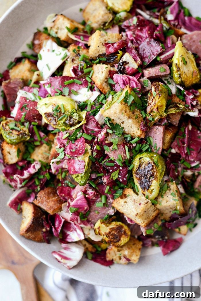 25+ Delicious St. Patrick's Day Recipes 39 Corned Beef and Rye Panzanella salad with roasted vegetables and dressing
