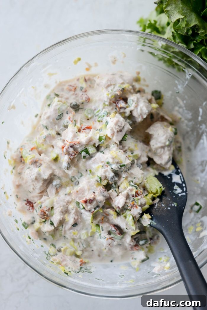 Sun-Kissed Tuna Medley 7 combined Sun-dried Tomato Tuna Salad in glass bowl