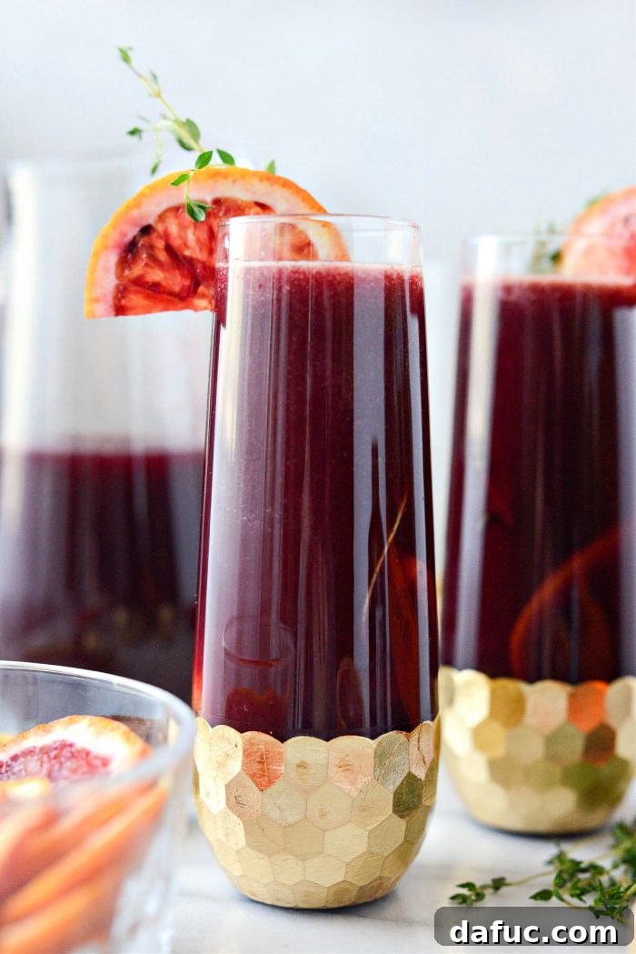Velvet Vanilla Blood Orange Mimosas 2 Stunning Vanilla Blood Orange Mimosas in elegant flutes