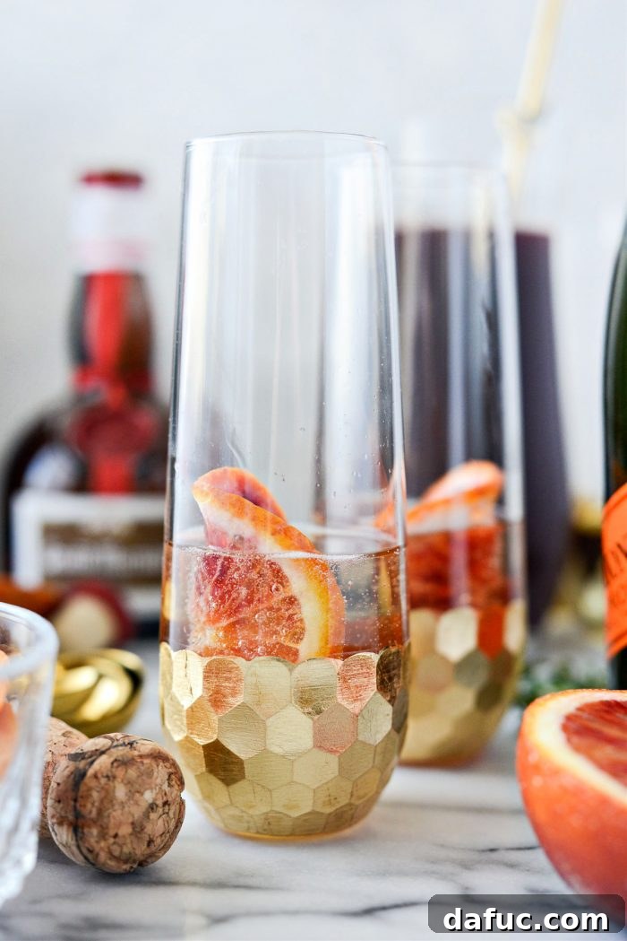 Velvet Vanilla Blood Orange Mimosas 10 A blood orange slice carefully placed into a mimosa glass