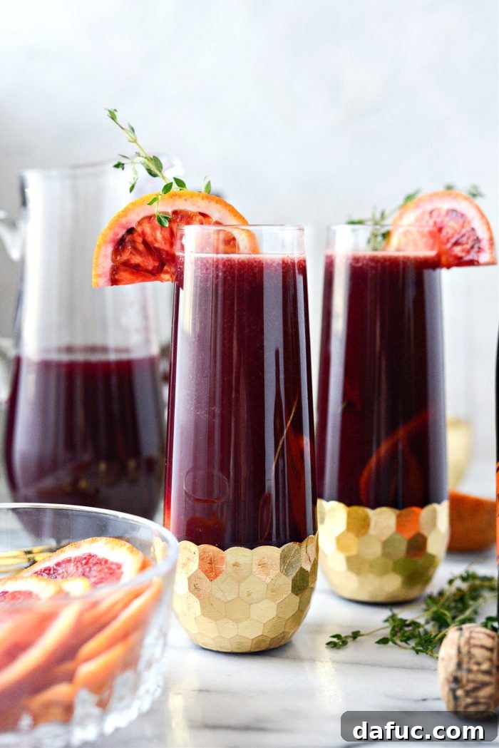 Velvet Vanilla Blood Orange Mimosas 13 Close-up of a perfectly prepared Vanilla Blood Orange Mimosa