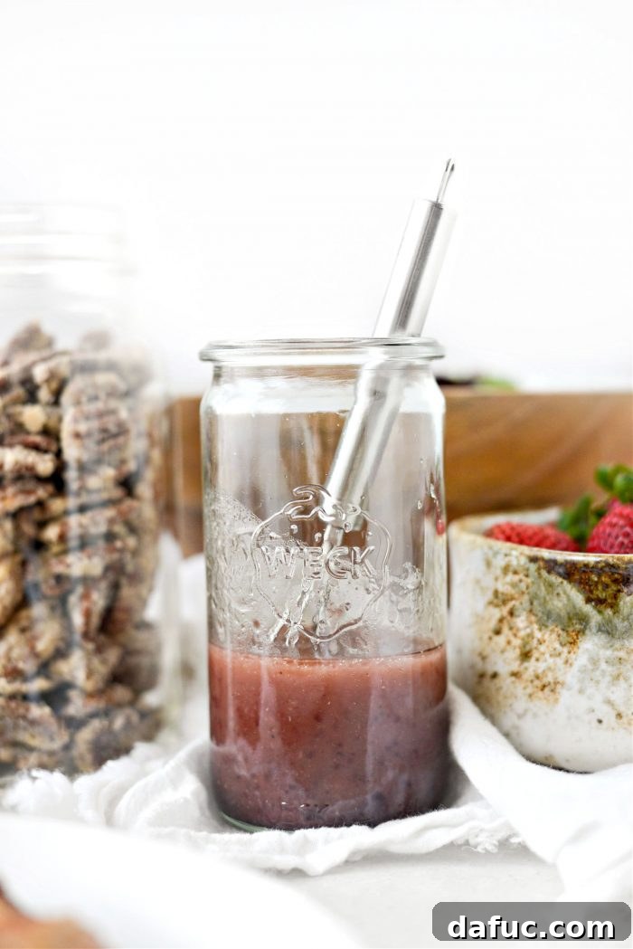 Finished raspberry walnut vinaigrette in a jar after whisking
