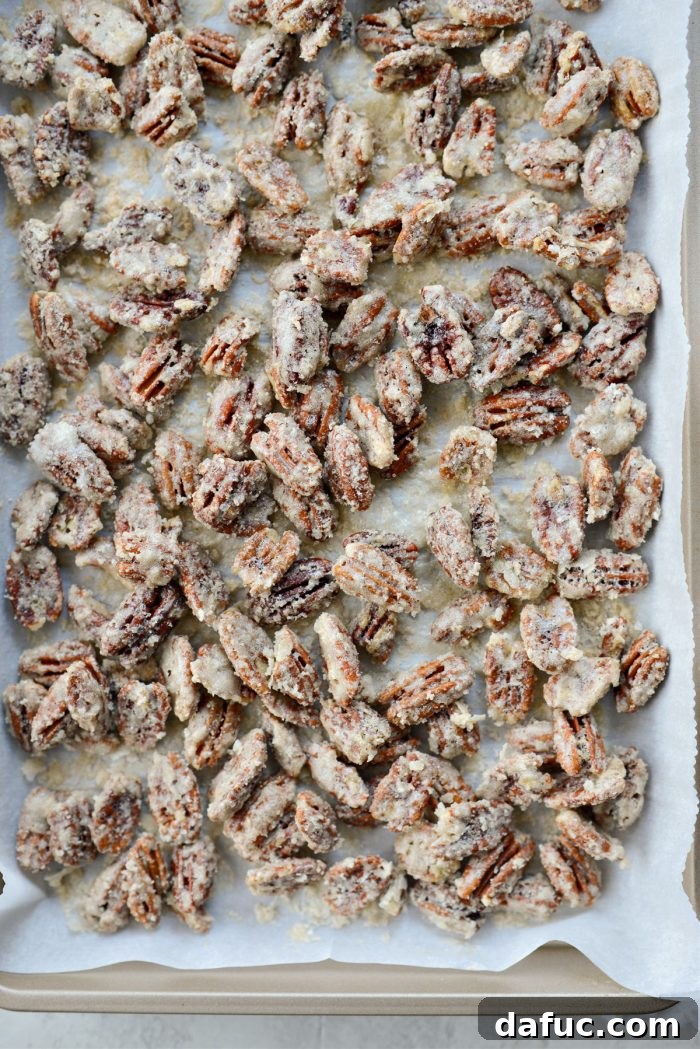 Another appealing shot of candied pecans, highlighting their sweet coating and rich color