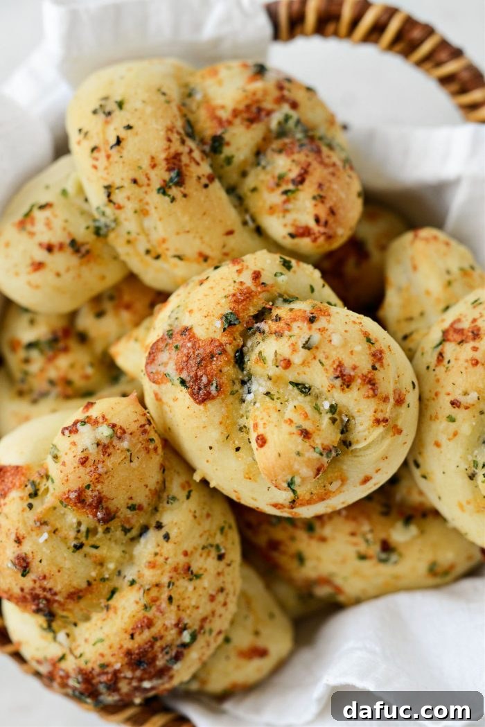 Another close-up of the Easy Homemade Garlic Herb Knots, showing their soft interior