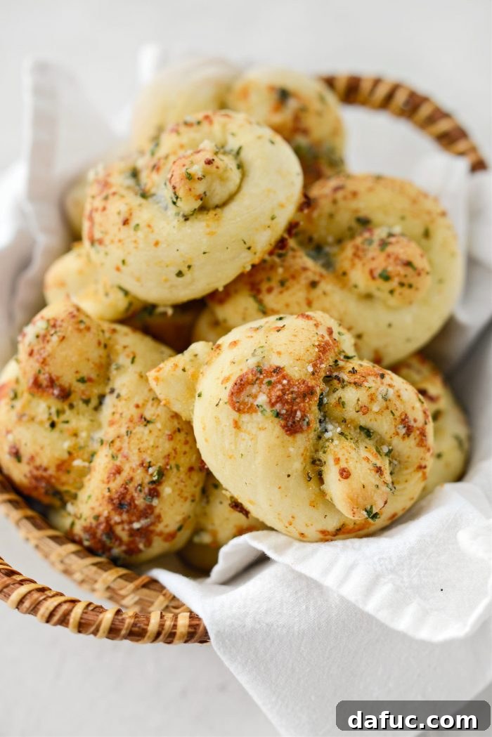 A serving of Easy Homemade Garlic Herb Knots, perfectly golden and ready to eat