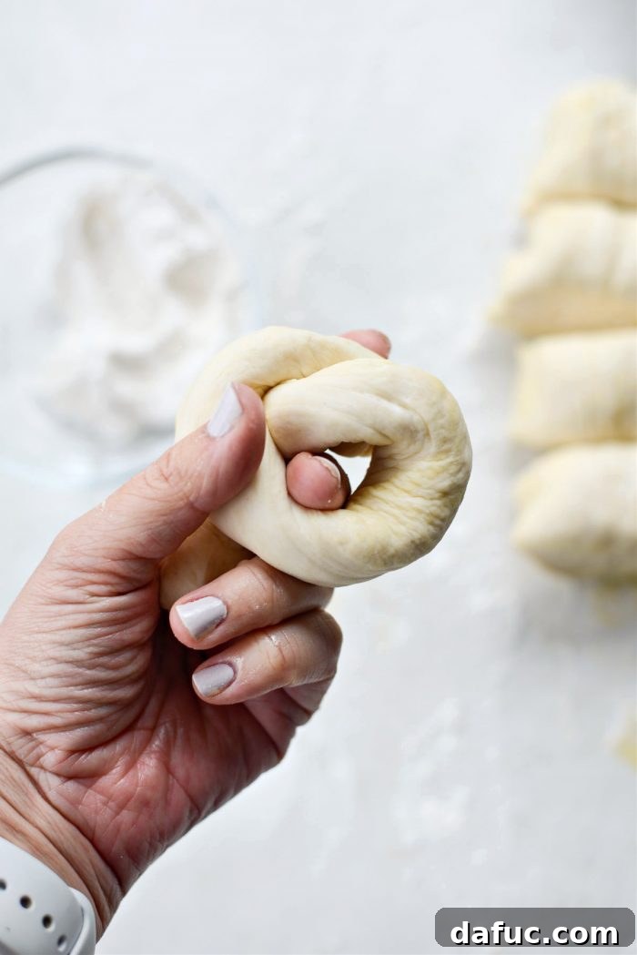 Tying a dough rope into a knot