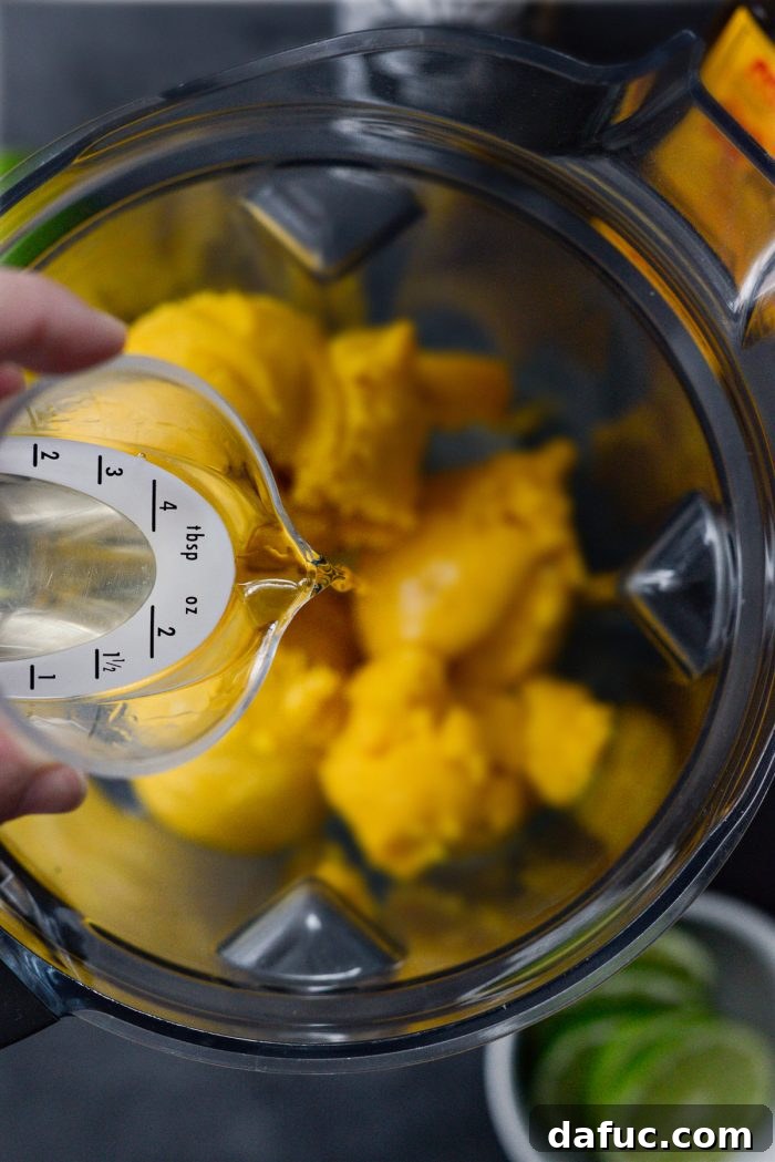 Smoked Mango Swirl 11 pour in mezcal