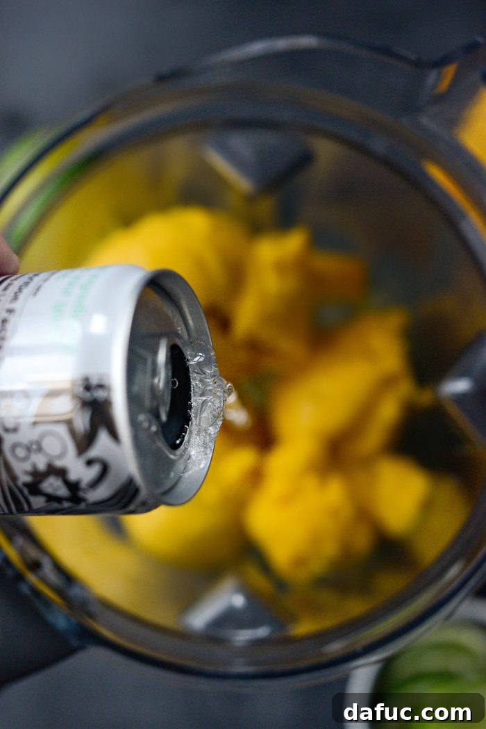 Smoked Mango Swirl 13 pouring in dry vanilla bubbly