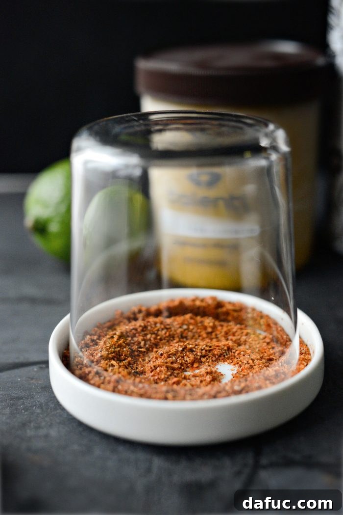 Smoked Mango Swirl 7 rim a glass in tajin