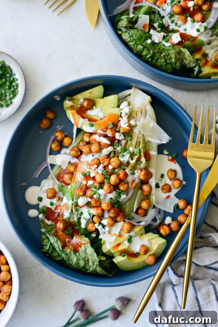 Air Fryer Buffalo Chickpea Caesar Salad - A close-up of the finished salad with crispy romaine and buffalo chickpeas