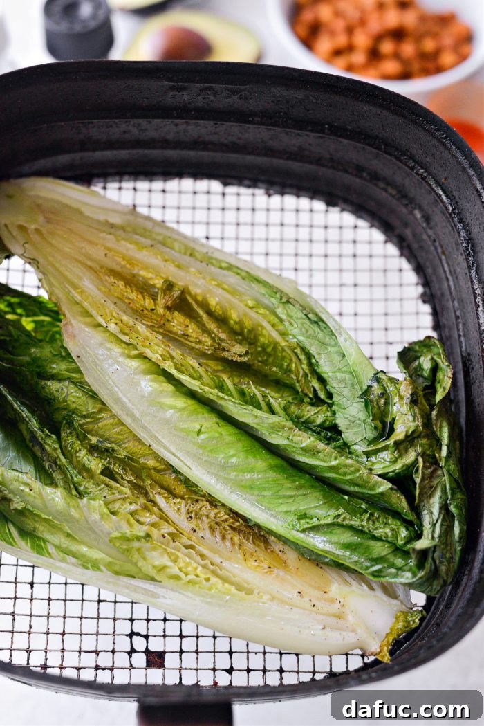 Perfectly air-fried romaine lettuce with crispy edges and vibrant green color.