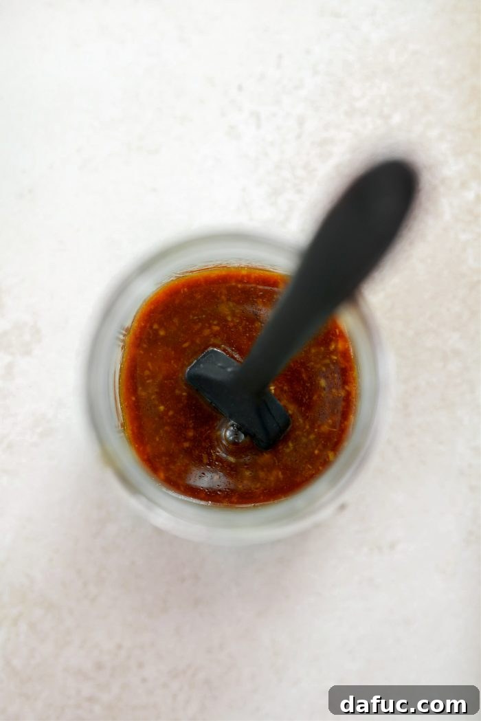 A portion of the Huli Huli marinade reserved in a separate small bowl for basting later