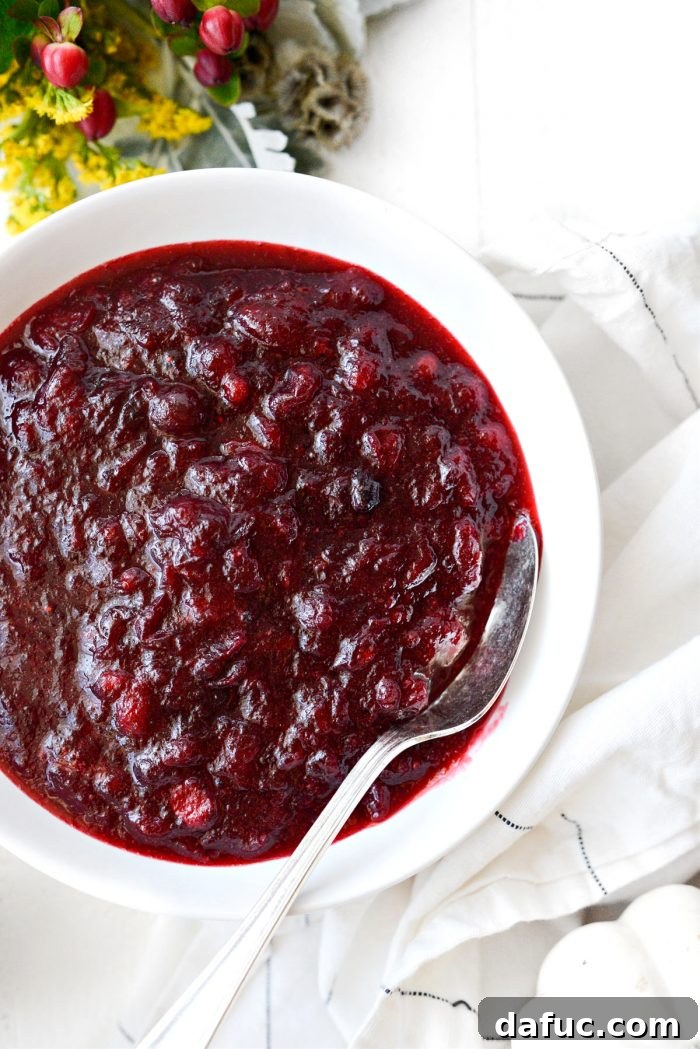 homemade cranberry sauce in a white bowl, ready to be served