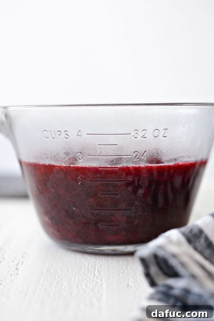 homemade cranberry sauce cooling in a bowl