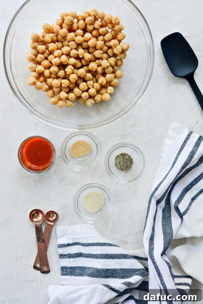 Ingredients for Crispy Air Fryer Buffalo Chickpeas laid out on a table