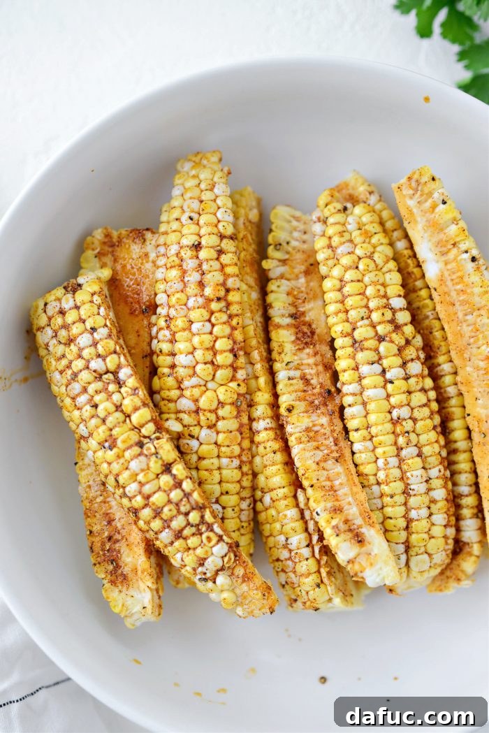 Oiled corn wedges gathered in a bowl