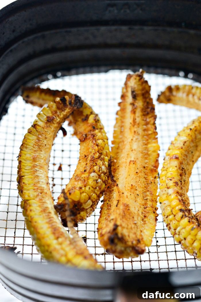 Air fried corn ribs showing their curled and crispy texture