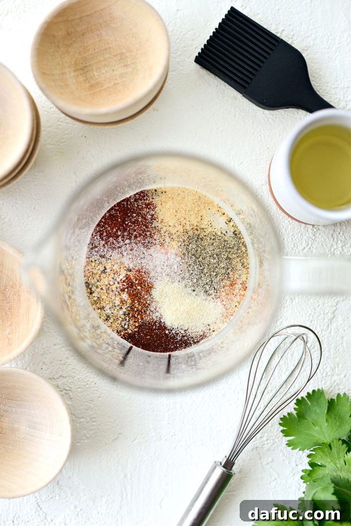 Various spices measured in small containers