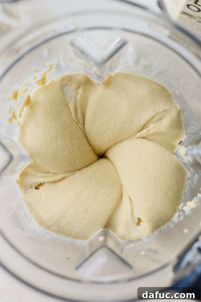 Velvet Smooth Blender Hummus 14 Ultra creamy hummus blending in a high-powered blender