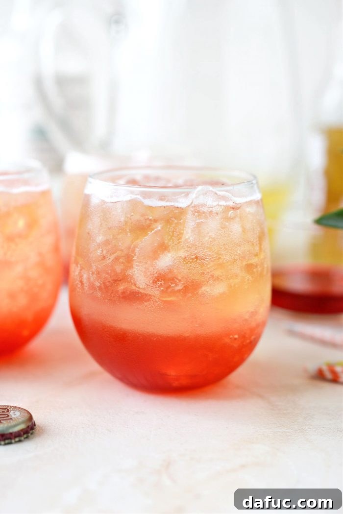 Tropical Tequila Sunrise Shandy 14 Finished Pineapple Tequila Sunrise Shandy displaying beautiful color layers
