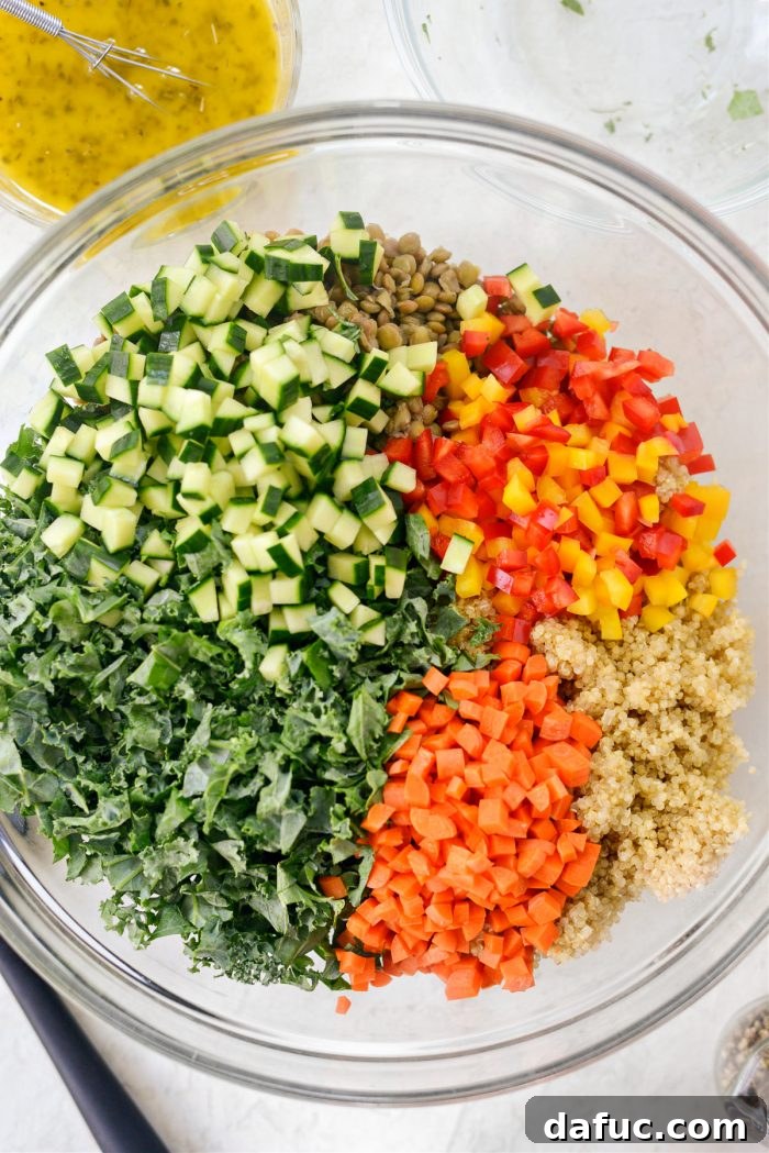 Fresh Kale and Diced Vegetables Added to Grain and Legume Base