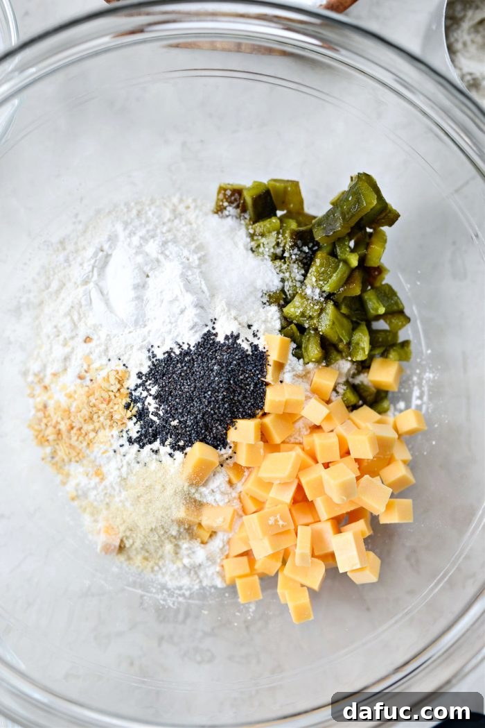Kickin' Air Fryer Jalapeño Cheddar Bagels 8 ingredients in a mixing bowl