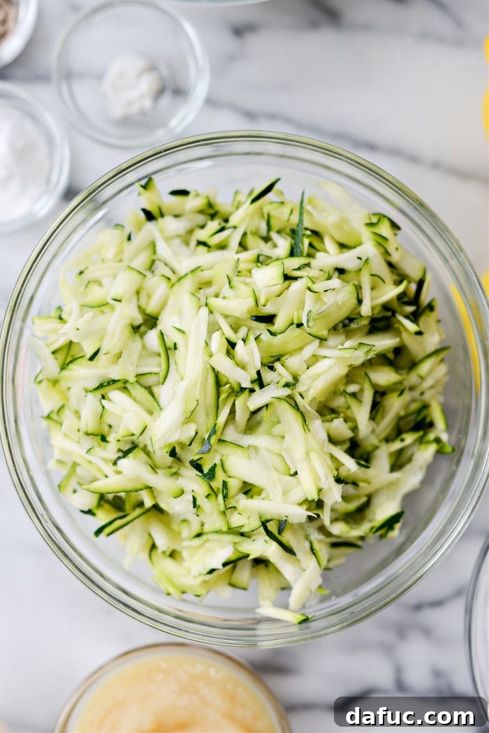 Bowl of freshly grated zucchini, with seeds removed