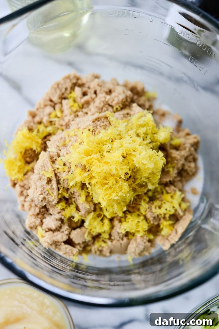 Granulated sugar, light brown sugar, and lemon zest in a separate mixing bowl