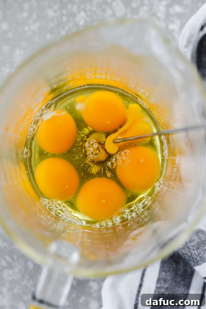 Crispy Hash Brown Morning Burritos 5 Crack 6 eggs into a bowl or liquid measuring cup.