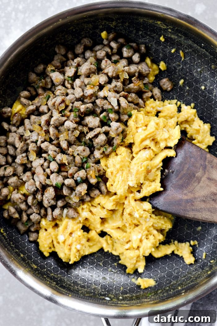 Crispy Hash Brown Morning Burritos 10 Add sausage mixture to eggs once they are cooked.